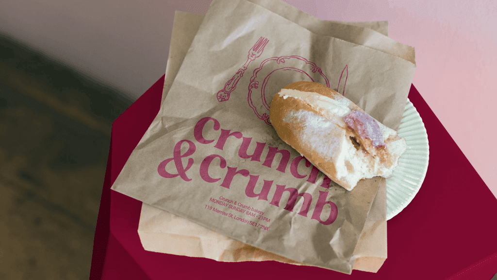 Cream-filled pastry on Crunch & Crumb paper bag